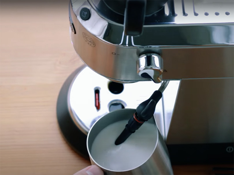 Frothing milk on DeLonghi Dedica Deluxe after removing panarello