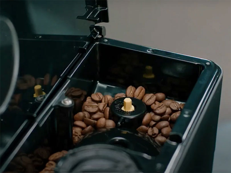Saeco PicoBaristo - Close up of bean hopper and grinder adjustment dial