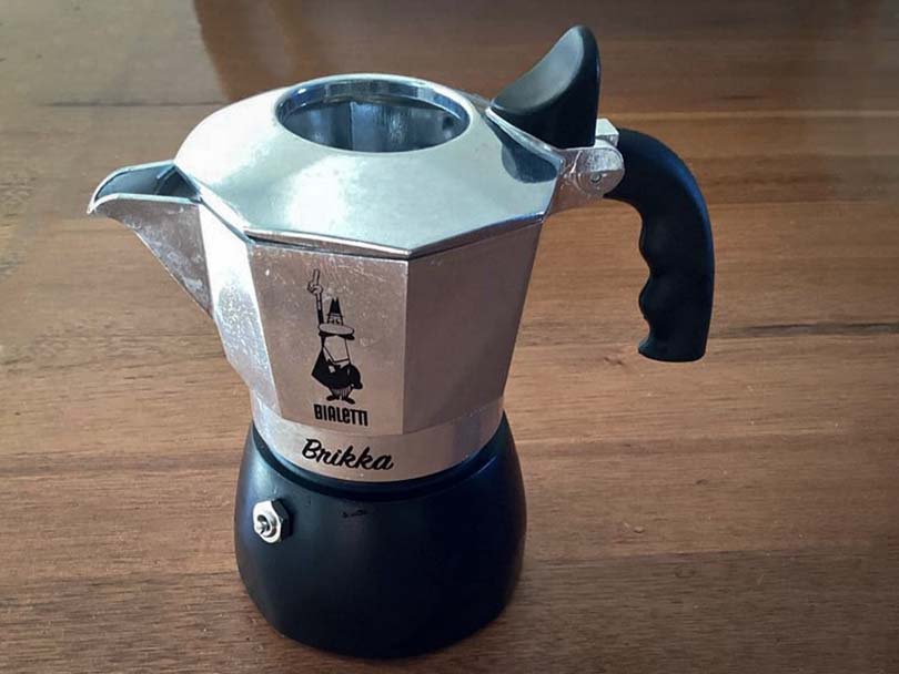 Bialetti Brikka moka pot sitting on a table
