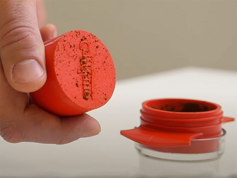 The flimsy branded tamper which is included as part of the Cafflano Kompresso