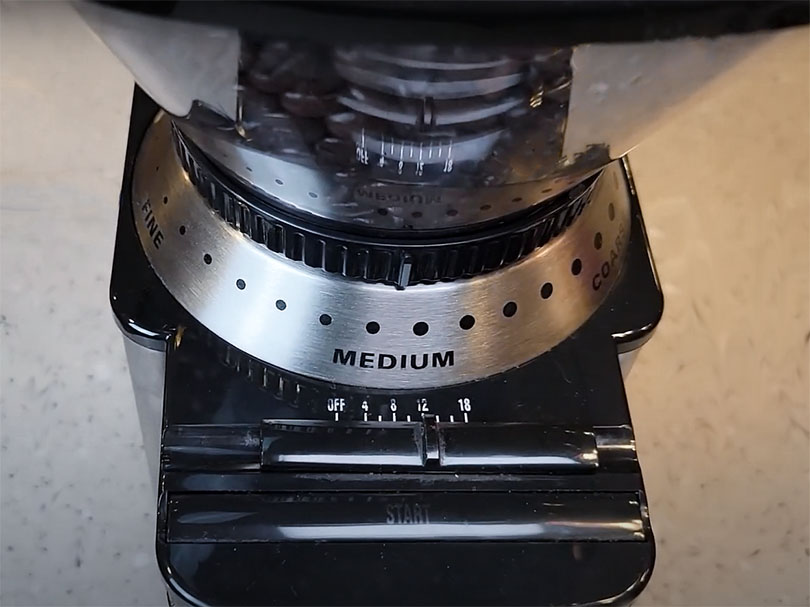Close up of the grind adjustment dial of the Cuisinart DBM-8 electric coffee grinder