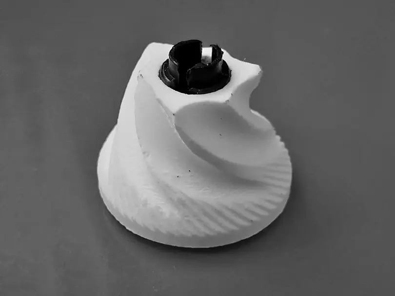 Close up of a replacement ceramic burr for the Porlex Mini