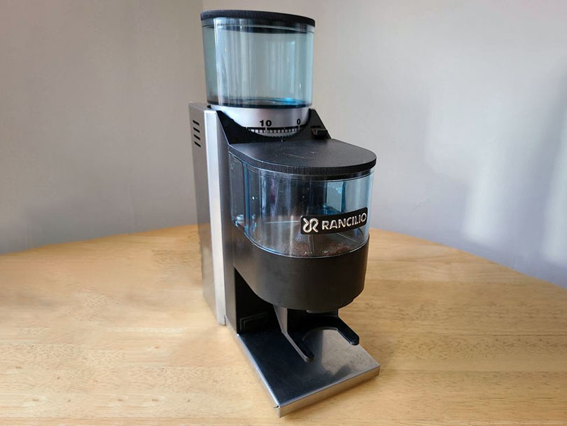 Rancilio Rocky doser model sitting on wooden table