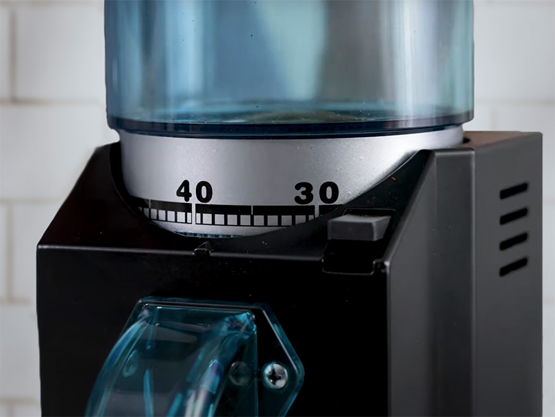 Close up of the grind adjustment dial on the Rancilio Rocky coffee grinder