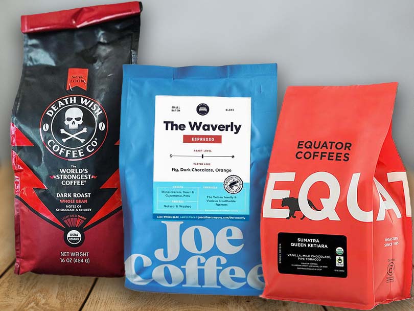 Some of the best espresso beans sitting on a table (Death Wish, The Waverly from Stumptown, and Sumatra Queen Ketiara from Equator Coffees)