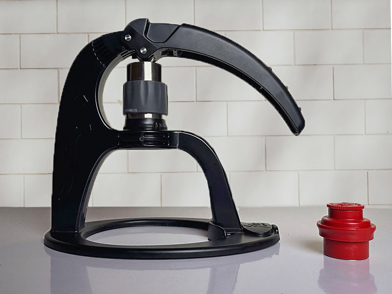 Side view of the Flair Neo Flex with 2-in-1 bottomless portafilter (flow control portafilter off to the side)