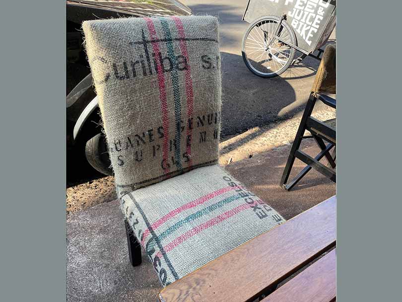 Chair upholstered with jute coffee bean sacks - a unique coffee gift