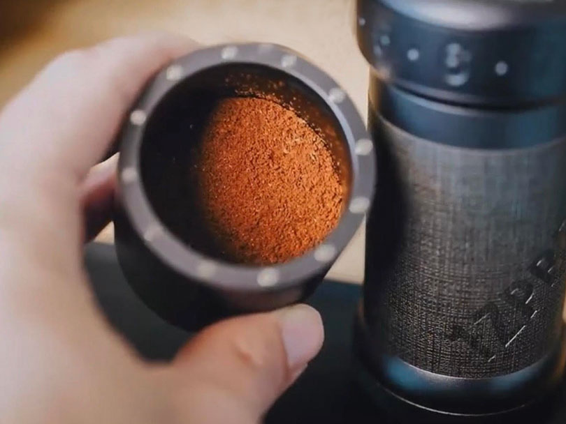 Freshly ground coffee in the catch cup of the 1Zpresso K Ultra