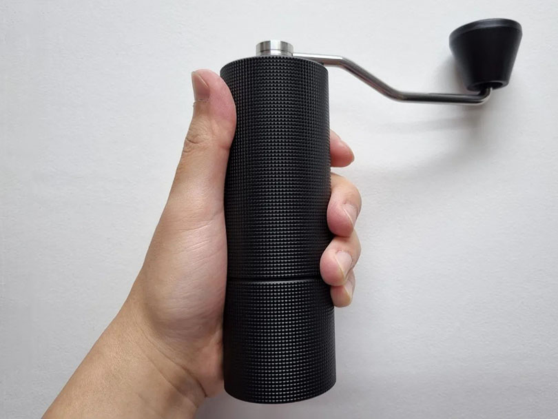 Holding the Timemore C3 up to the camera