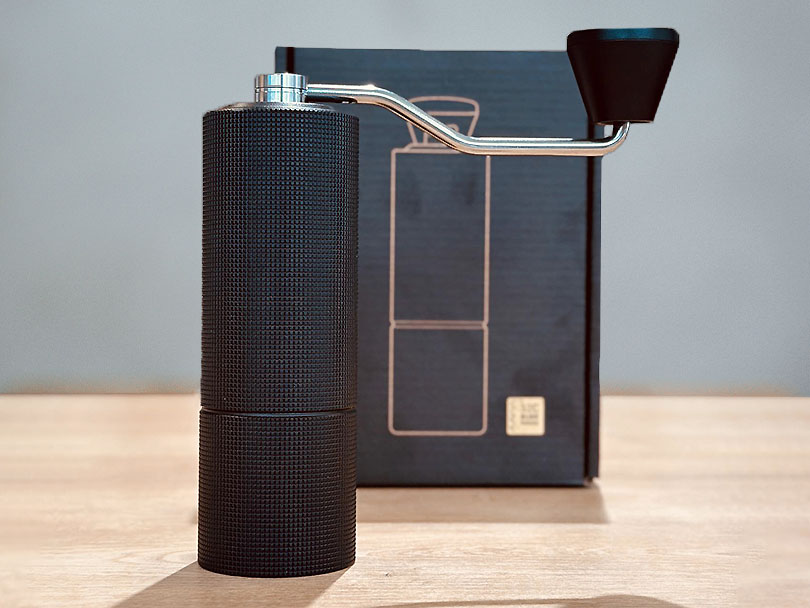 Timemore C3 on table in front of its box