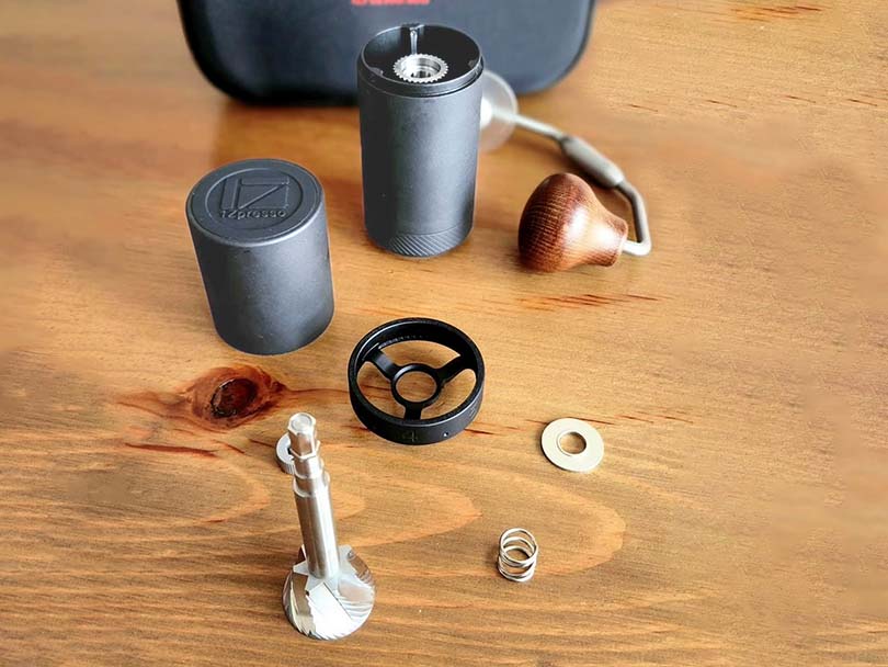 1Zpresso X Ultra disassembled and parts laid out on wooden table