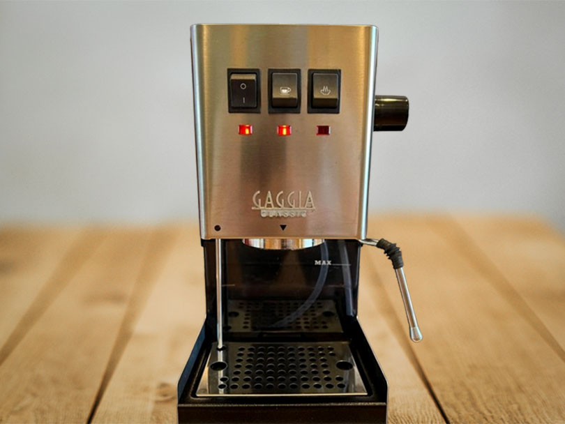 Front view of the Gaggia Classic Evo Pro on a wooden table