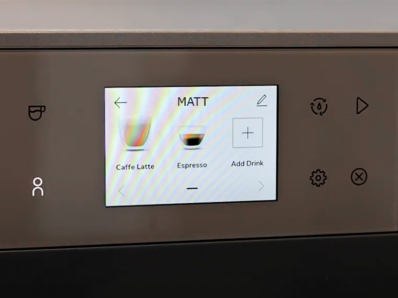Close up of the Kitchen Aid's KF7's user interface displaying Matt's user profile with options for Caffe Latte, Espresso, and + Add Drink