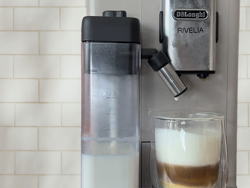 The DeLonghi Rivelia making a cappuccino