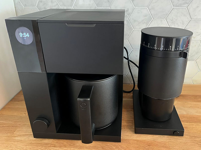 Fellow Aiden drip coffee maker beside the Fellow Opus grinder