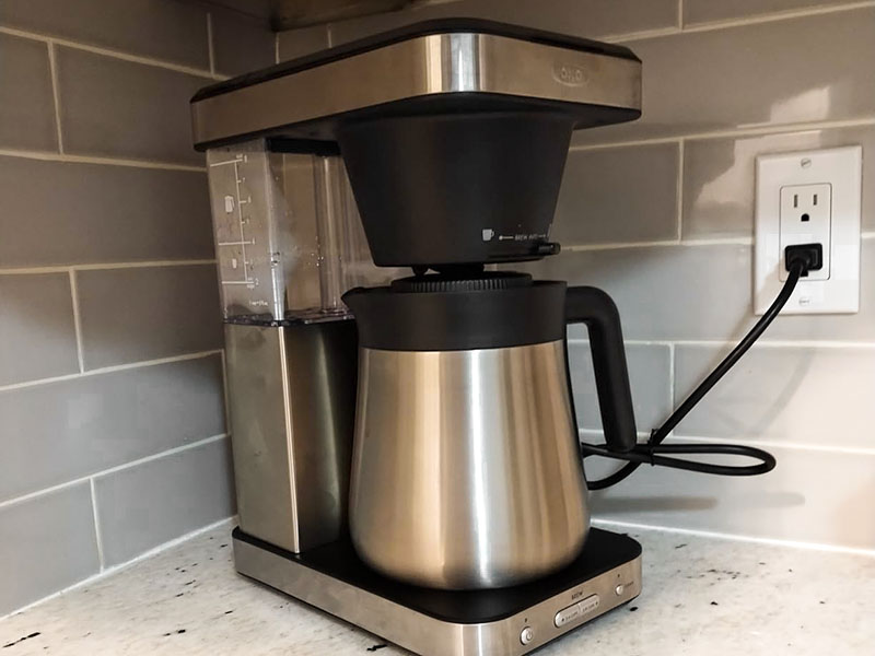 OXO Brew 8-cup coffee maker (SCA certified) plugged into wall
