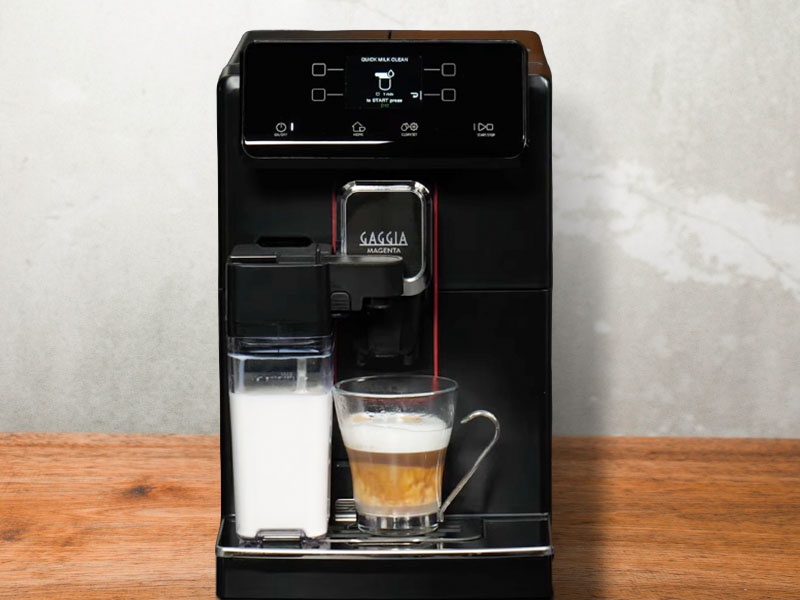 Gaggia Magenta Prestige with a freshly mde cappuccino on the drip tray
