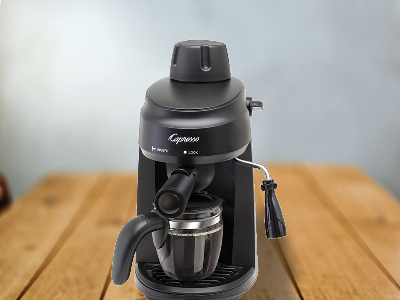 Front view of the Capresso 305.01 on wooden table