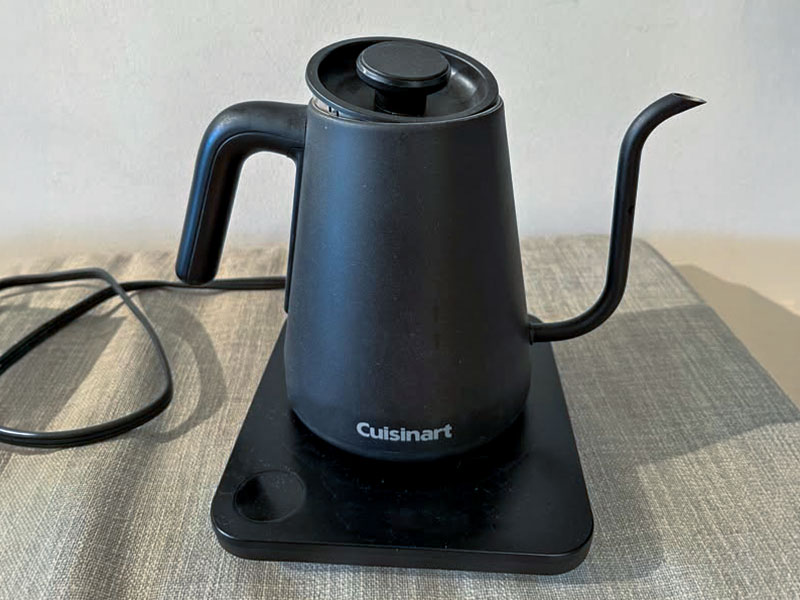Cuisinart GK-1 gooseneck kettle sitting on textured surface