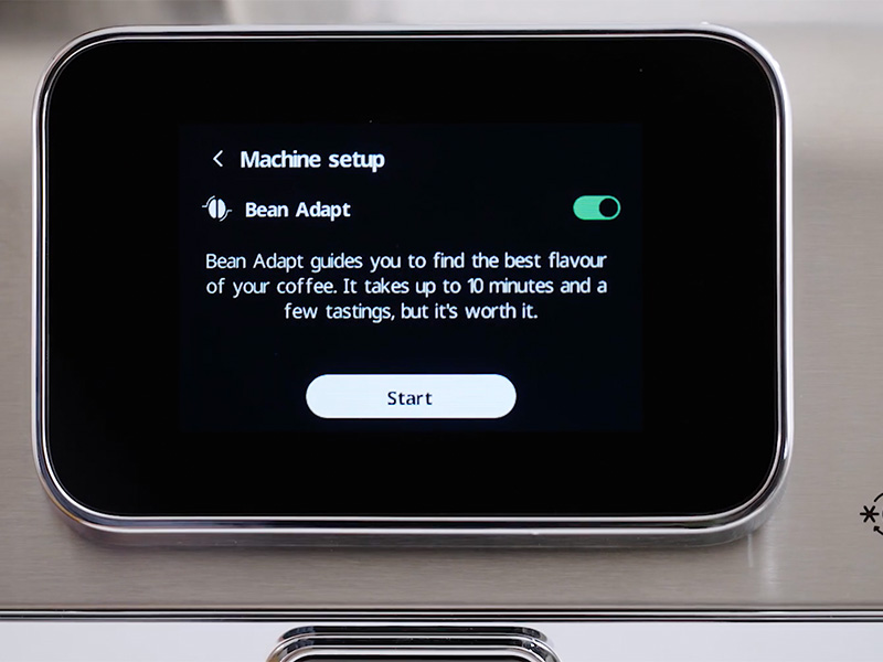 Close-up of the onboarding screen for the DeLonghi La Specialista Touch displaying Bean Adapt process