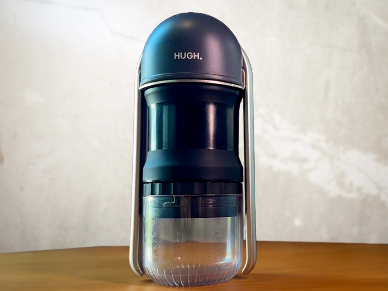 The Leverpresso V4 by Hugh sitting on wooden rable with arms down