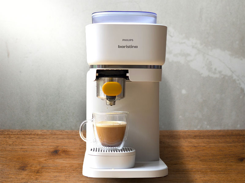 Freshly made lungo on the drip tray of the Philips Baristina