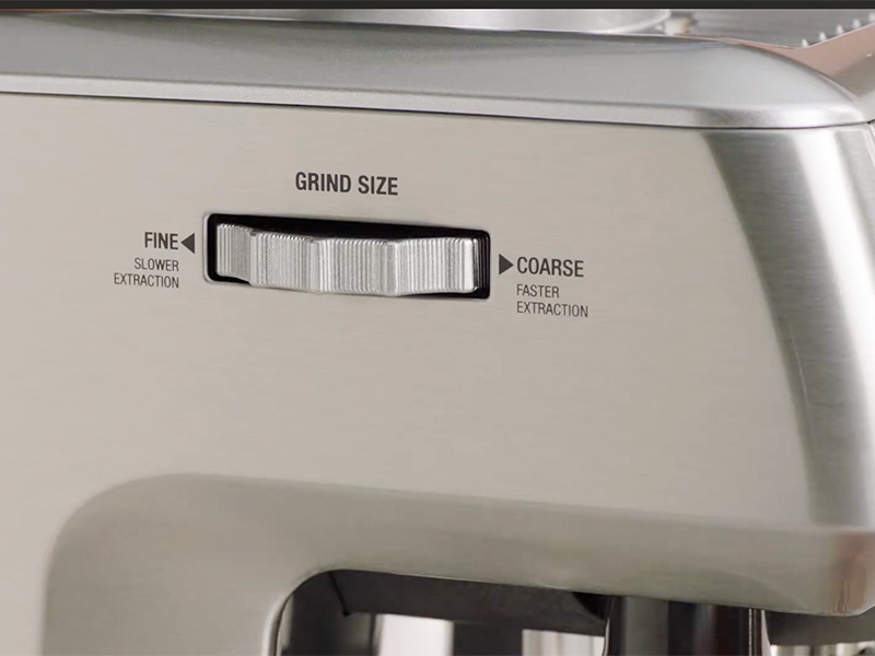 Close-up of the grind adjustment dial on the Breville Barista Touch