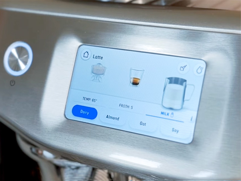 Close-up of the different milk selections (dairy, almond, oat, soy) on the Breville Barista Touch Impress MilkQ system