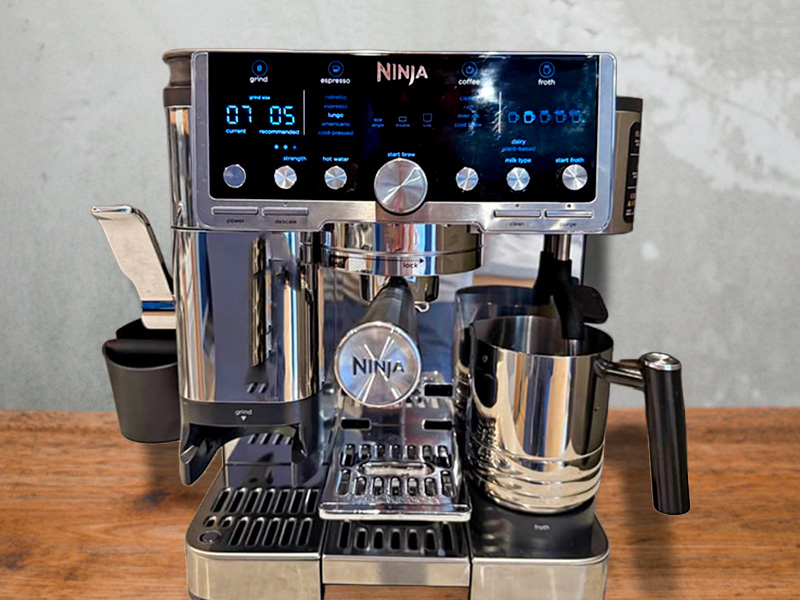 Ninja Cafe Luxe Pro espresso machine sitting on wooden countertop