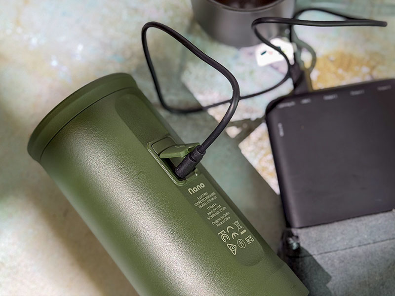 Outin Nano recharging via USB-C cable attached to a portable battery pack