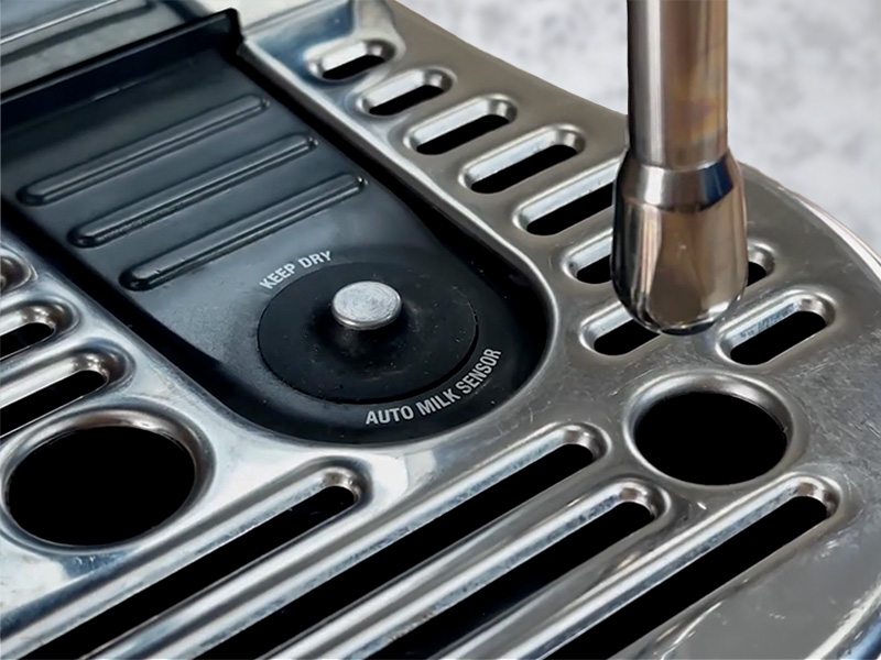 Close-up of the auto milk sensor on the Breville Bambino Plus