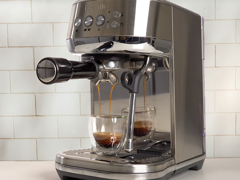 Breville Bambino Plus mid-way through making a shot of espresso