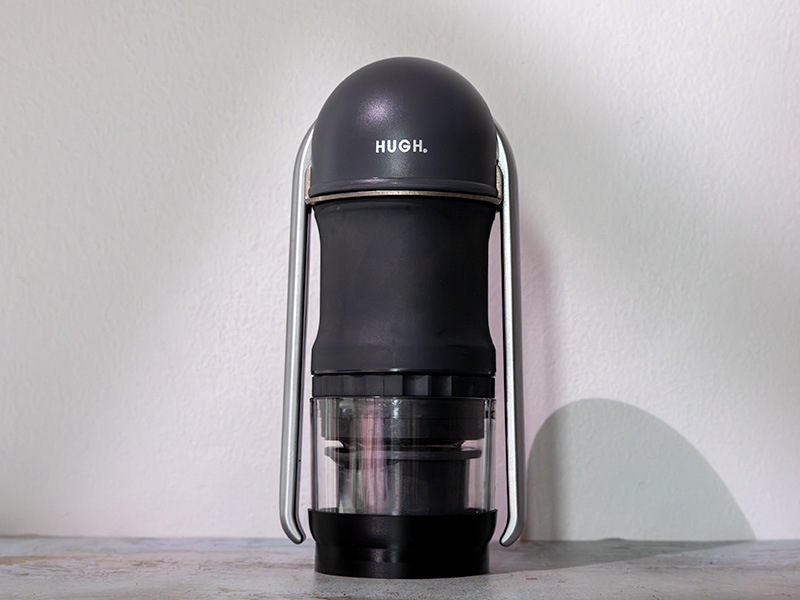 Straight-on view of the HUGH Leverpresso Lite V4 with its arms pulled fully down